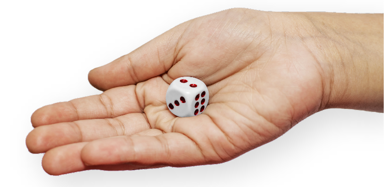 An image of a hand holding a die 